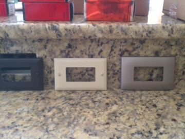 Here are a few examples of the different options available for cover plates. Left to right - black, ivory, brushed nickel. 